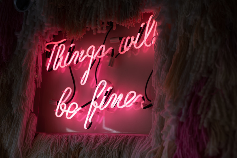 A neon sign showing the encouraging message 'things will be fine'