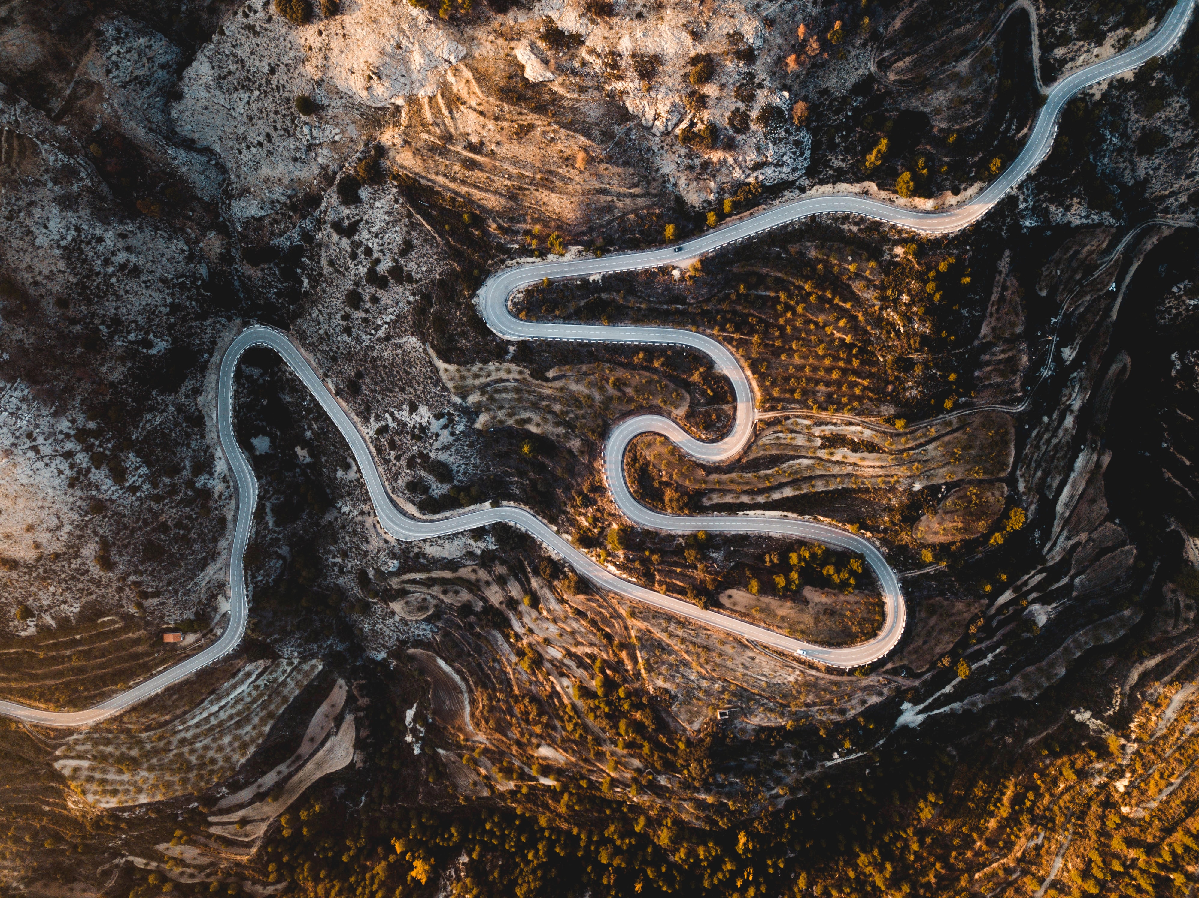 A winding road through a mountain landscape